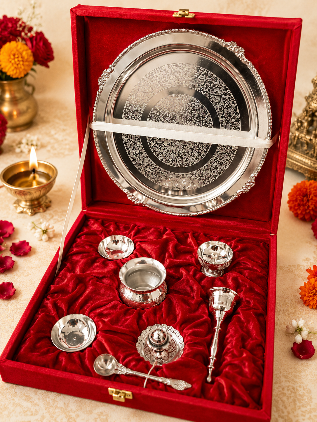 Engraved silver pooja thali set with matching accessories for Diwali gifting